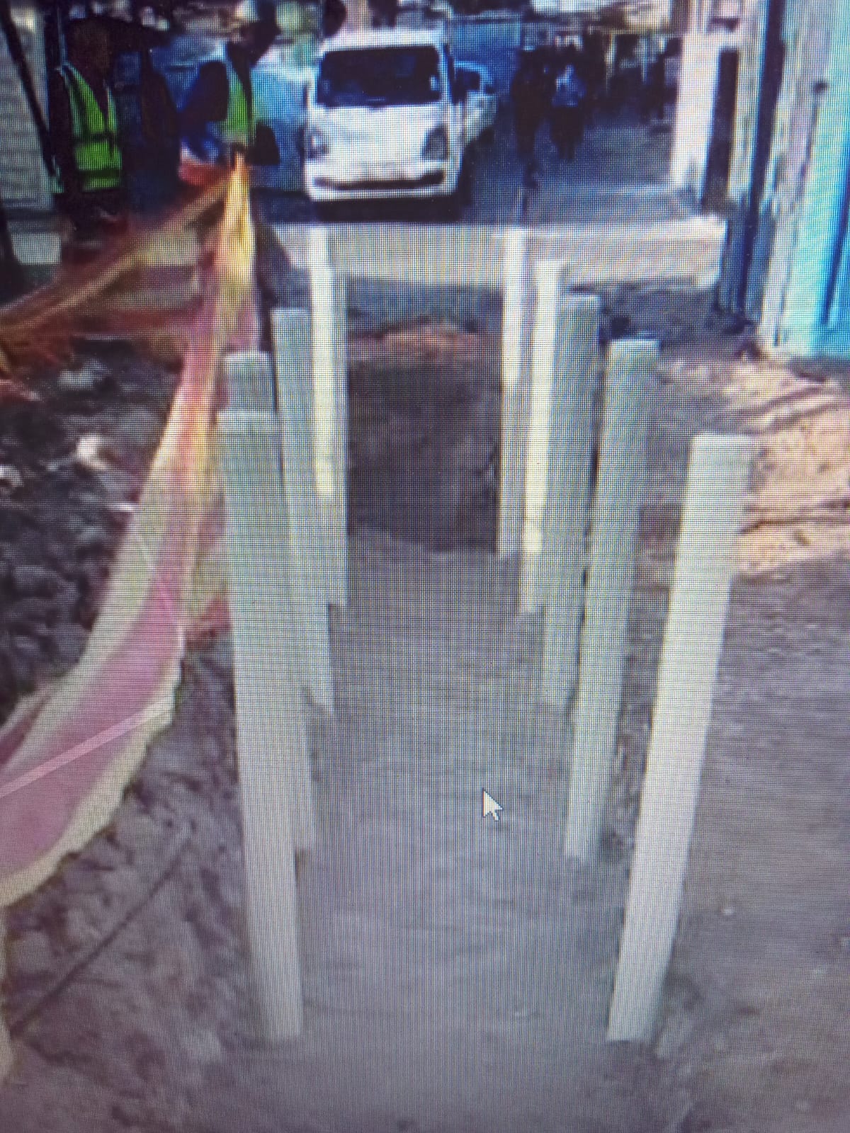 Sidewalk service pipe installation in progress